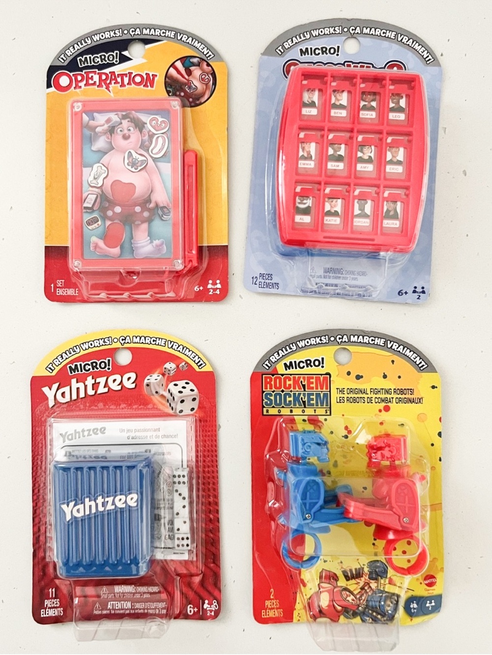 NIB Micro Games Bundle – Operation, Guess Who?, Yahtzee & Rock ’Em Sock ’Em
